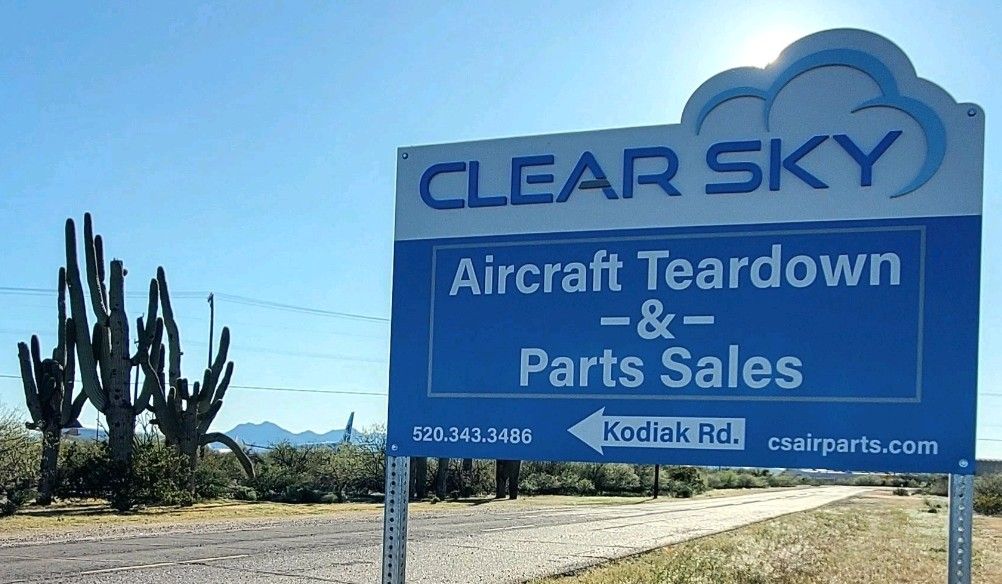 clear sky airport location sign